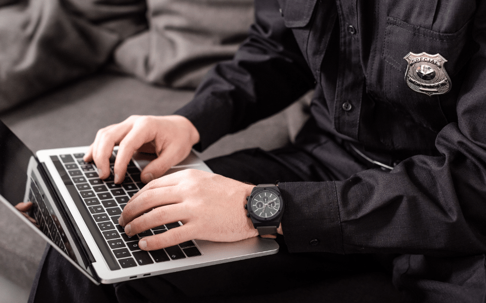 Law Enforcement officer on computer